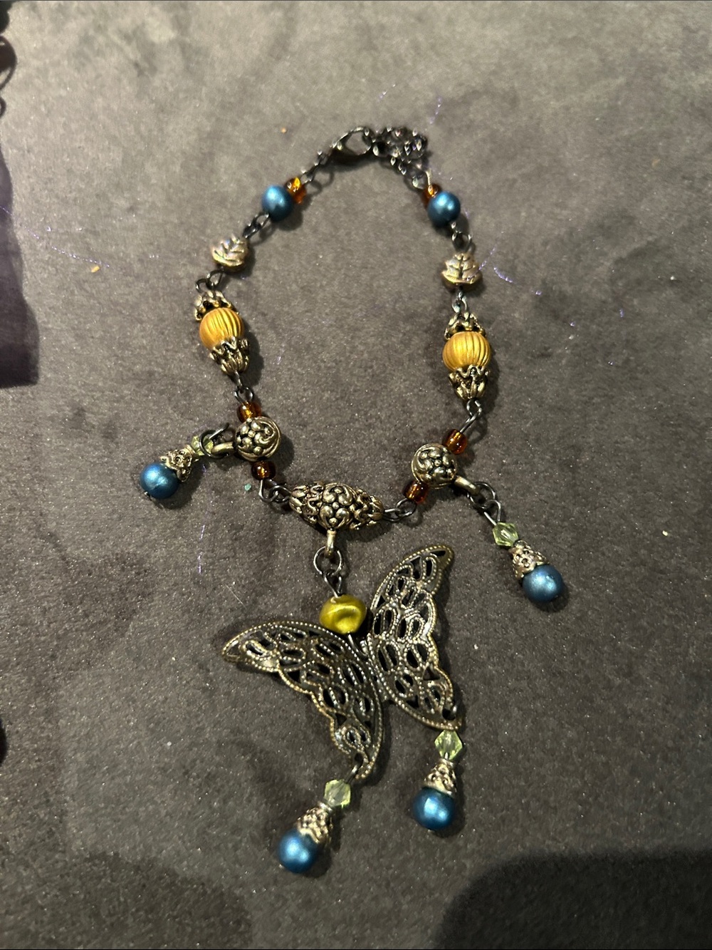 Filigree Butterfly Charm Bracelet in Blue and Gold - Unbranded